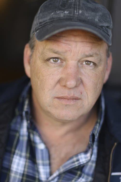 Dane Rhodes headshot
