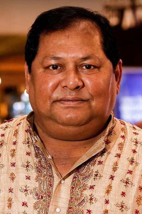 Kharaj Mukherjee headshot