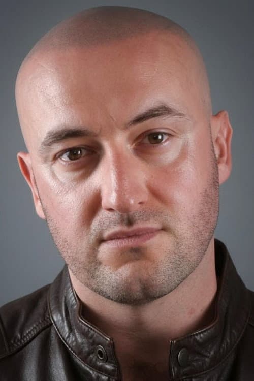 Alex Ballesteros headshot