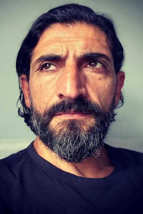 Numan Acar headshot