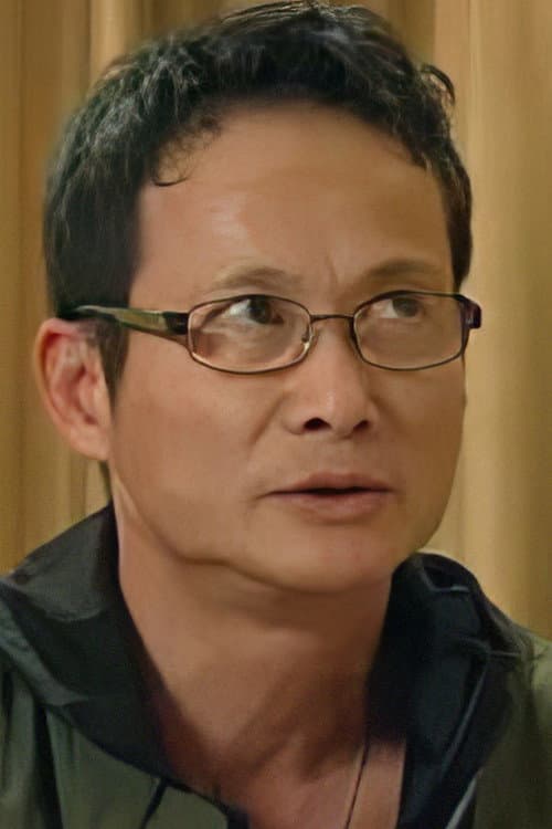 Chris Lee Kin-Sang headshot